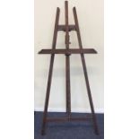 A large easel decorated with panelling. Est. £40 -