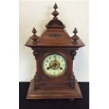 A Continental mahogany mantle clock.