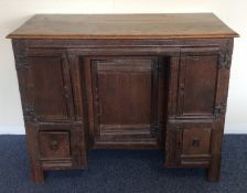 An Antique oak twin pedestal two drawer and two do