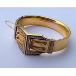 A high carat gold bangle attractively decorated wi