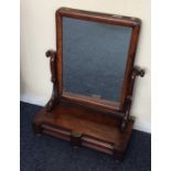 A mahogany two drawer toilet mirror. Est. £20 - £3