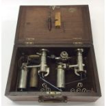 A cased pressure gauge set. Est. £80 - £120.