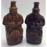 A pair of stoneware Toby jugs, the hats mounted as