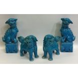 Two pairs of Dogs of Foo in turquoise colour. Est.