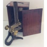 A mahogany cased microscope by W Heath of Plymouth. Est. £30 - £40.