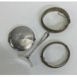 A silver compact together with a silver bangle, pu