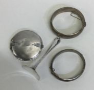 A silver compact together with a silver bangle, pu