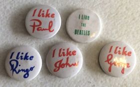 A set of five rare Beatles collectable pin badges