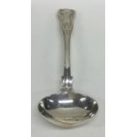 EXETER. A silver Kings' pattern sauce ladle. By JW&