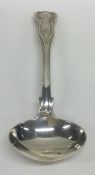 EXETER. A silver Kings' pattern sauce ladle. By JW&