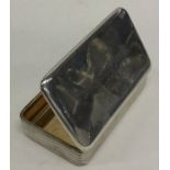 A Georgian reeded silver snuff box with gilt inter