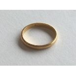 A 22 carat plain wedding band. Approx. 4.9 gram