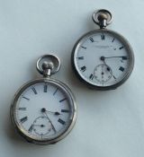 Two silver open face pocket watches with white ena