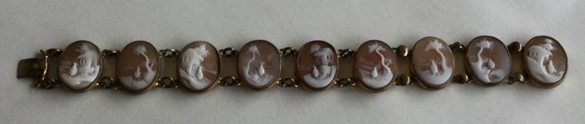 A shell cameo bracelet with concealed clasp. Appro