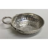 An 18th Century silver bleeding bowl with snake de