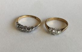 Two diamond three stone rings. Approx. 3.9 grams.