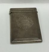 A good quality Victorian silver card case decorate