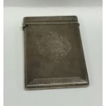 A good quality Victorian silver card case decorate