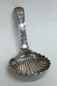 A small Georgian silver bright cut caddy spoon wit