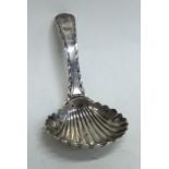 A small Georgian silver bright cut caddy spoon wit