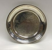 An Edwardian silver letter tray decorated with gro