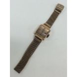 A 9 carat lady's wristwatch on mesh strap. Approx.