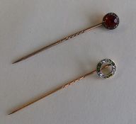 An unusual rose diamond and red stone stick pin to