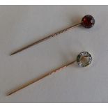 An unusual rose diamond and red stone stick pin to