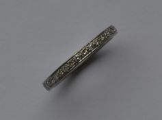 A good French diamond full eternity ring set in pl