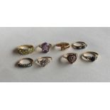 A group of eight 9 carat gem set rings. Approx. 20