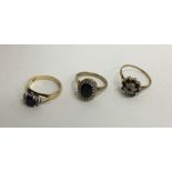 Four diamond mounted 9 carat gem set rings. Approx