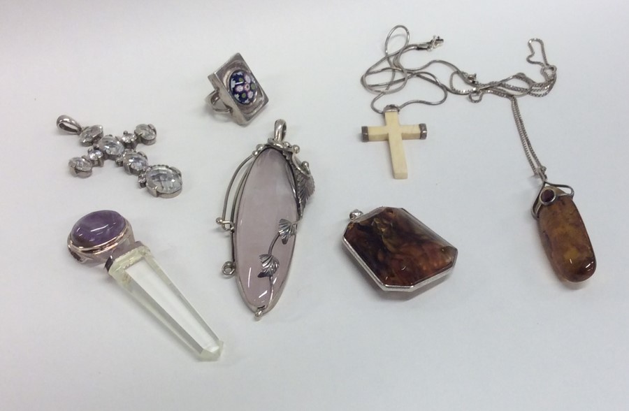 A silver and amber pendant together with other sil