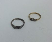 Two diamond mounted rings in 18 carat gold. Approx