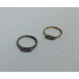 Two diamond mounted rings in 18 carat gold. Approx