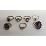 A group of eight 9 carat gem set rings. Approx. 18