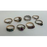 A bag containing eight 9 carat gems set rings. App