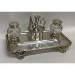 A good lady's silver inkstand on scroll feet with