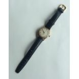 A gent's Garrard 9 carat wristwatch with silvered