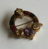 A good quality Scottish gold and agate brooch, the