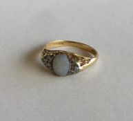 An opal and rose diamond half hoop ring in 18 cara