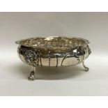 A Victorian half fluted silver sugar bowl with lio