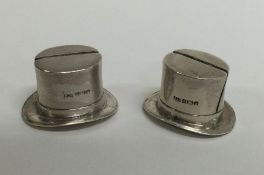 A pair of unusual silver novelty menu holders in t