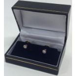 A pair of good diamond single stones mounted as dr