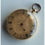 An 18 carat gold Swiss fob watch with engraved dec