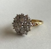 A large diamond cluster ring in 18 carat and plati