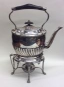 A silver plated half fluted kettle on stand of typ