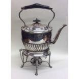 A silver plated half fluted kettle on stand of typ