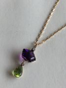 SUFFRAGETTE: An attractive drop pendant with diamo