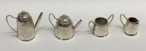 An attractive miniature silver four piece tea serv