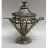 A Turkish silver vase and cover decorated with flo